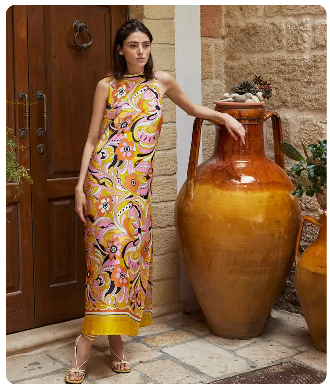 Ana Alcazar model wears elegant maxi dress made of high-quality polyester